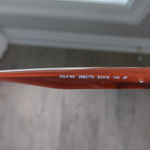 Authentic Dolce & Gabbana sunglasses. Gold rose detail on arms. Burnt br… - Picture 8 of 9